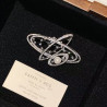 Women's Saturn star pearl suit brooch